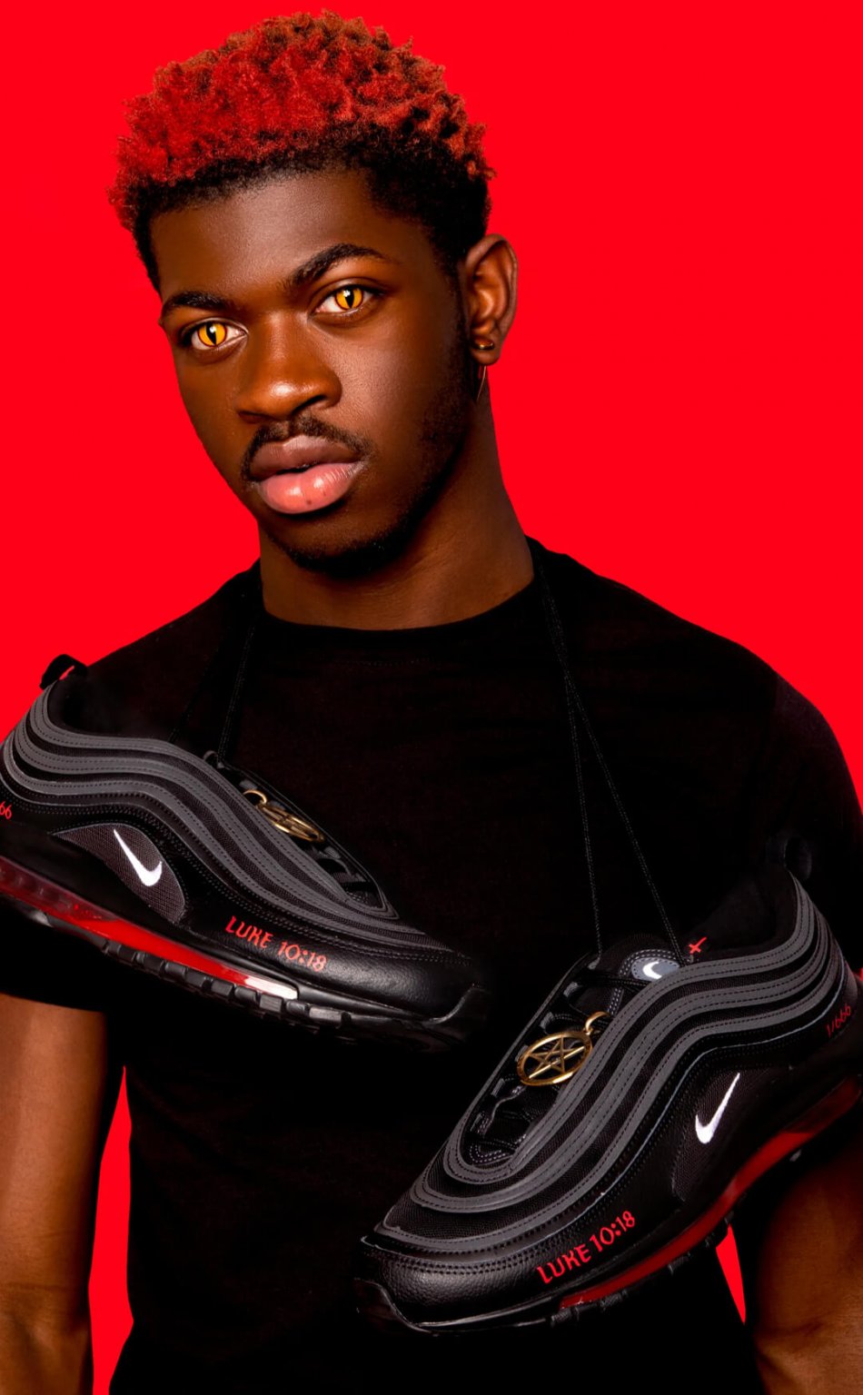 Lil Nas X with his Satan Shoe